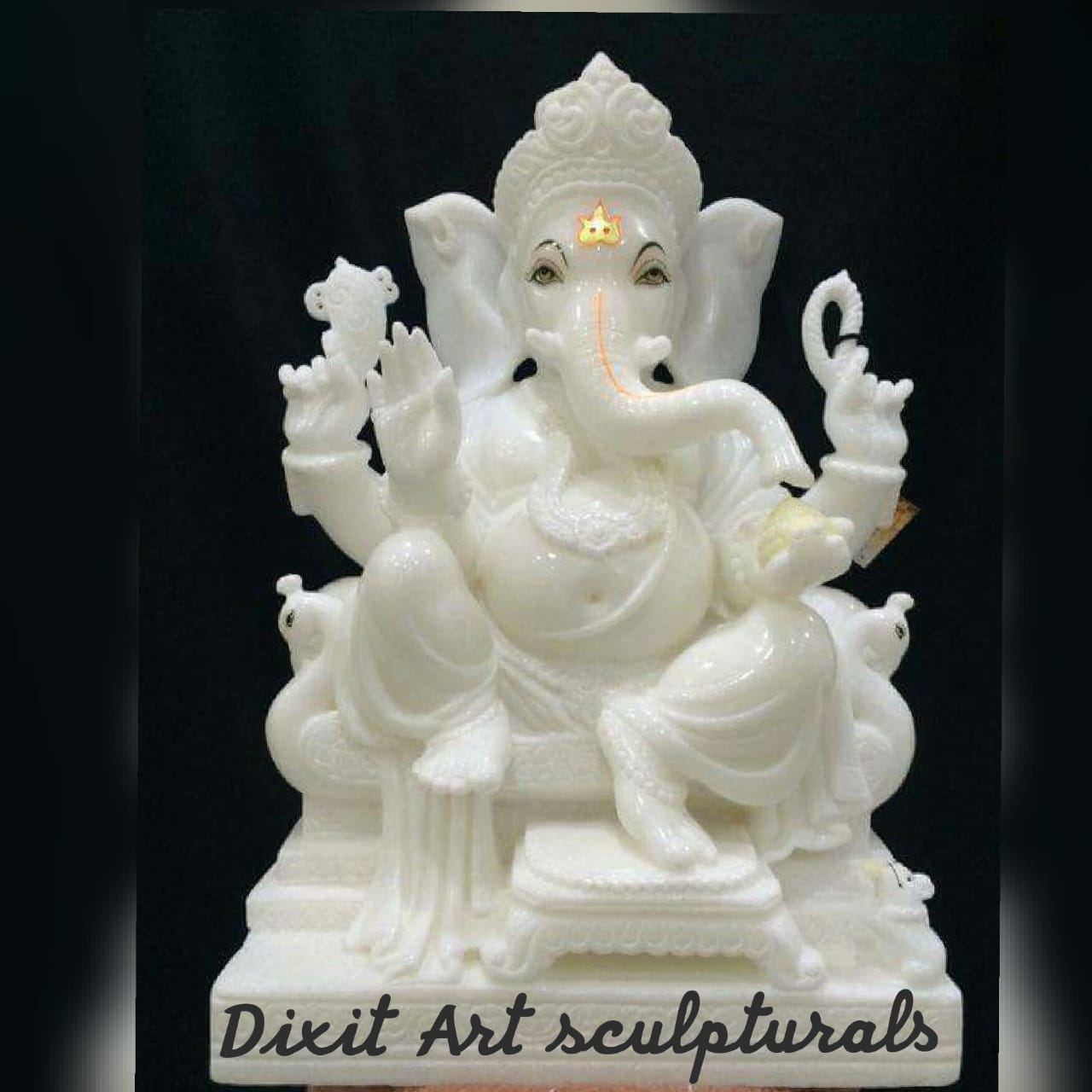 White Ganesh Statue In Lohit